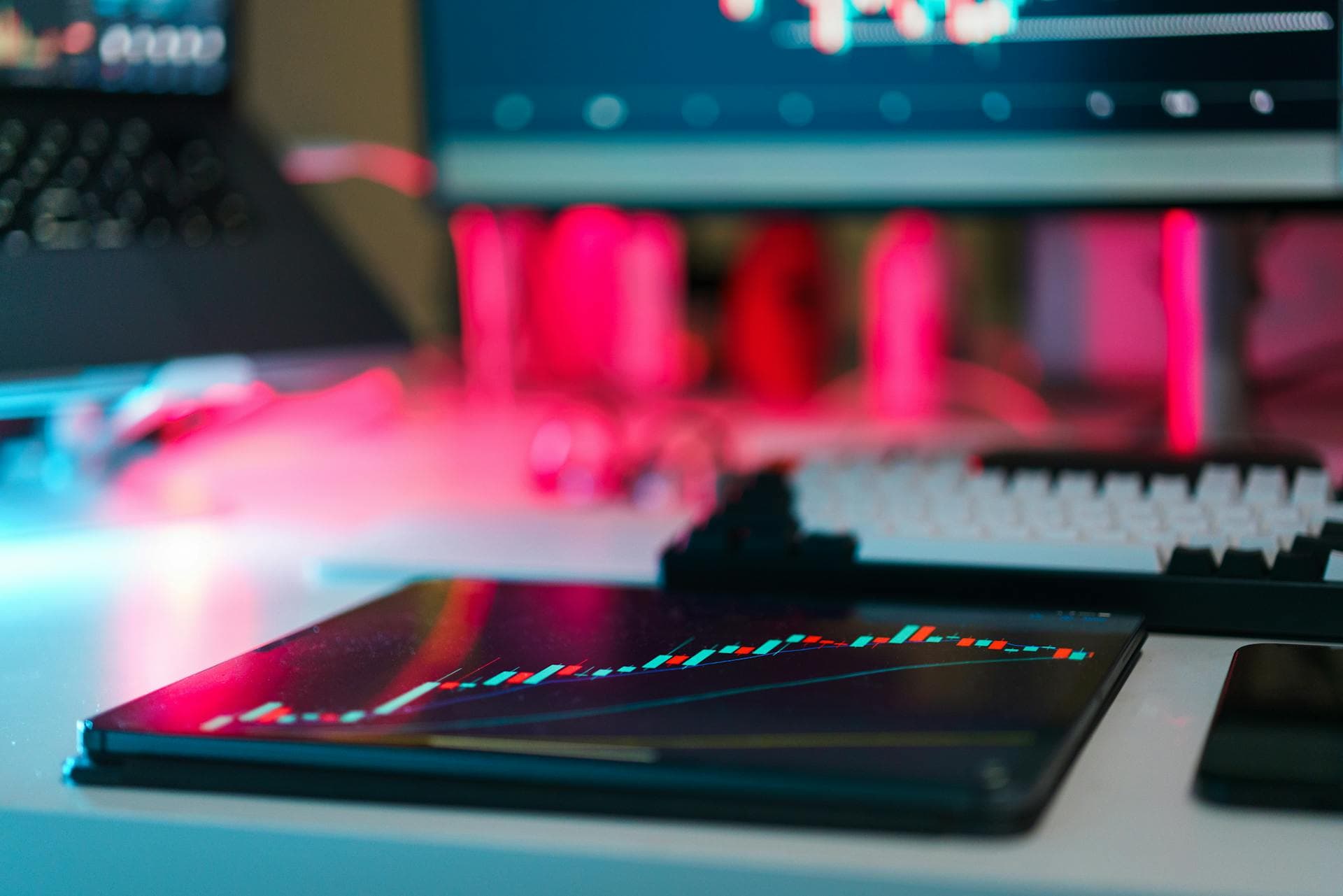 A modern workspace with multiple screens, representing the operating discipline that defines Nascaps